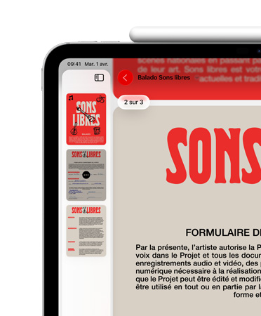 iPad, orientation paysage, Apple Pencil fixé magnétiquement sur le dessus, portion supérieure gauche de l’appareil montrant un PDF dans l’app Aperçu