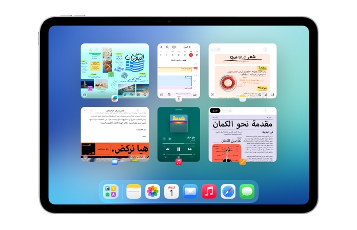 iPad بالوضع الأفقي، وشاشته تعرض تطبيقات متعددة مثل تطبيقَي التقويم والموسيقى ضمن ست نوافذ في صفين لإظهار النوافذ بالتساوي