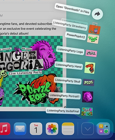 Close up of Dock across bottom with a series of files fanning out vertically from the Dock