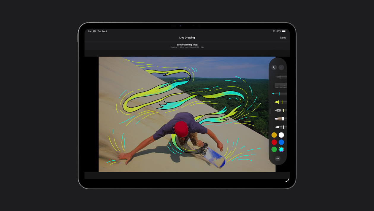 iPad Pro 13, patineur sur des dunes de sable avec des lignes de mouvement jaunes et bleues autour de lui, démo de Dessin en direct