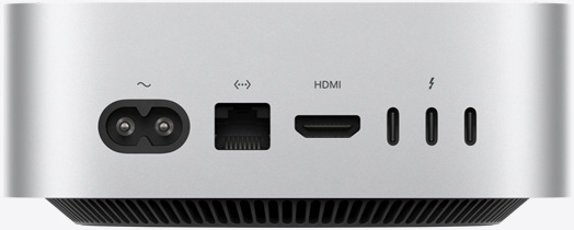 銀色 Mac mini 的背面，展示背面的連接埠：一個電源插口、一個 Ethernet 連接埠、一個 HDMI 連接埠，以及三個 Thunderbolt 連接埠。