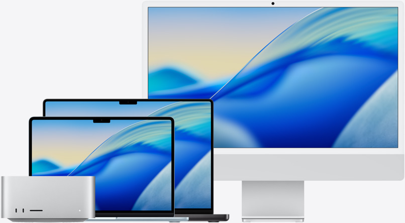 Le fond d’écran macOS Tahoe est affiché sur différents modèles de Mac, de gauche à droite : Mac Studio, MacBook Air 13 pouces bleu ciel, MacBook Pro 14 pouces noir infini et iMac 24 pouces argent