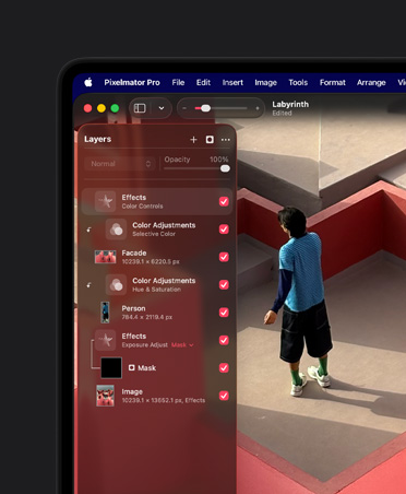 Écran de MacBook Pro 16 pouces, photo d’un homme dans un labyrinthe stylisé en trois dimensions